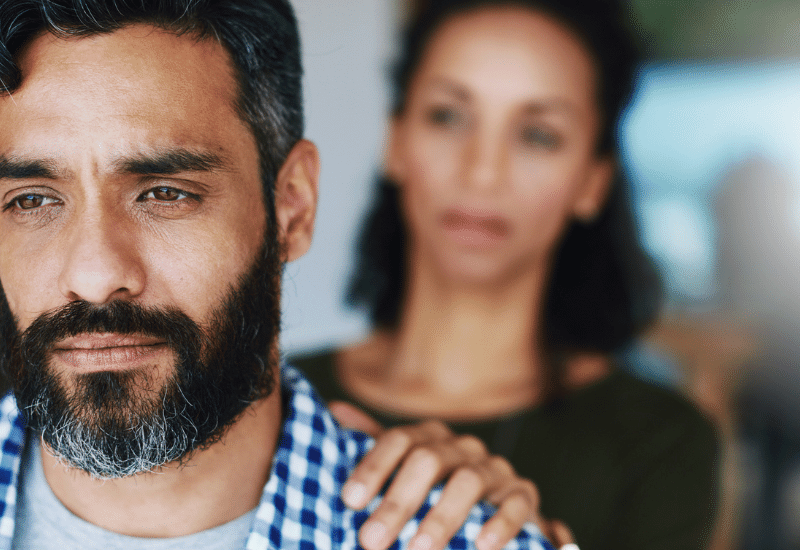Depressed man and concerned wife, TMS treatment for depression